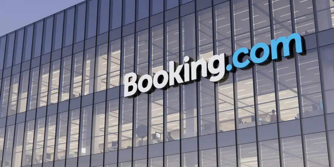 Amsterdam, Netherlands. November 3D CGI. Booking Holding Signage Logo Top Glass Building. Workplace Online Marketplace Homestay Rental Service Company in Office Building.